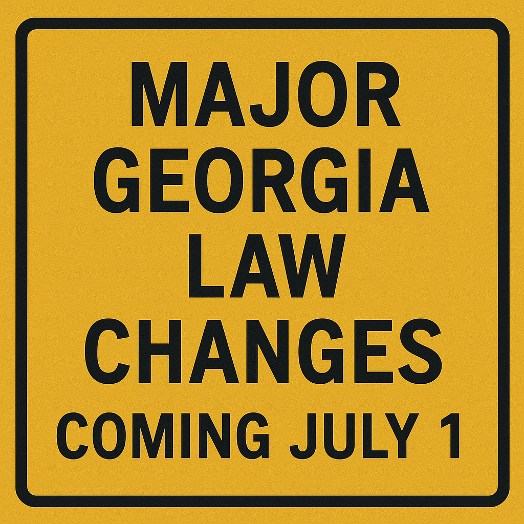 A yellow warning-style sign stating 'Major Georgia Law Changes Coming July 1'.
